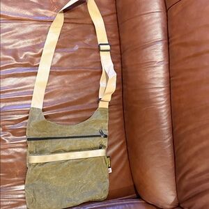 Unisex Brooklyn Industries Olive Green Canvas Crossbody Bag with Cream Strap.